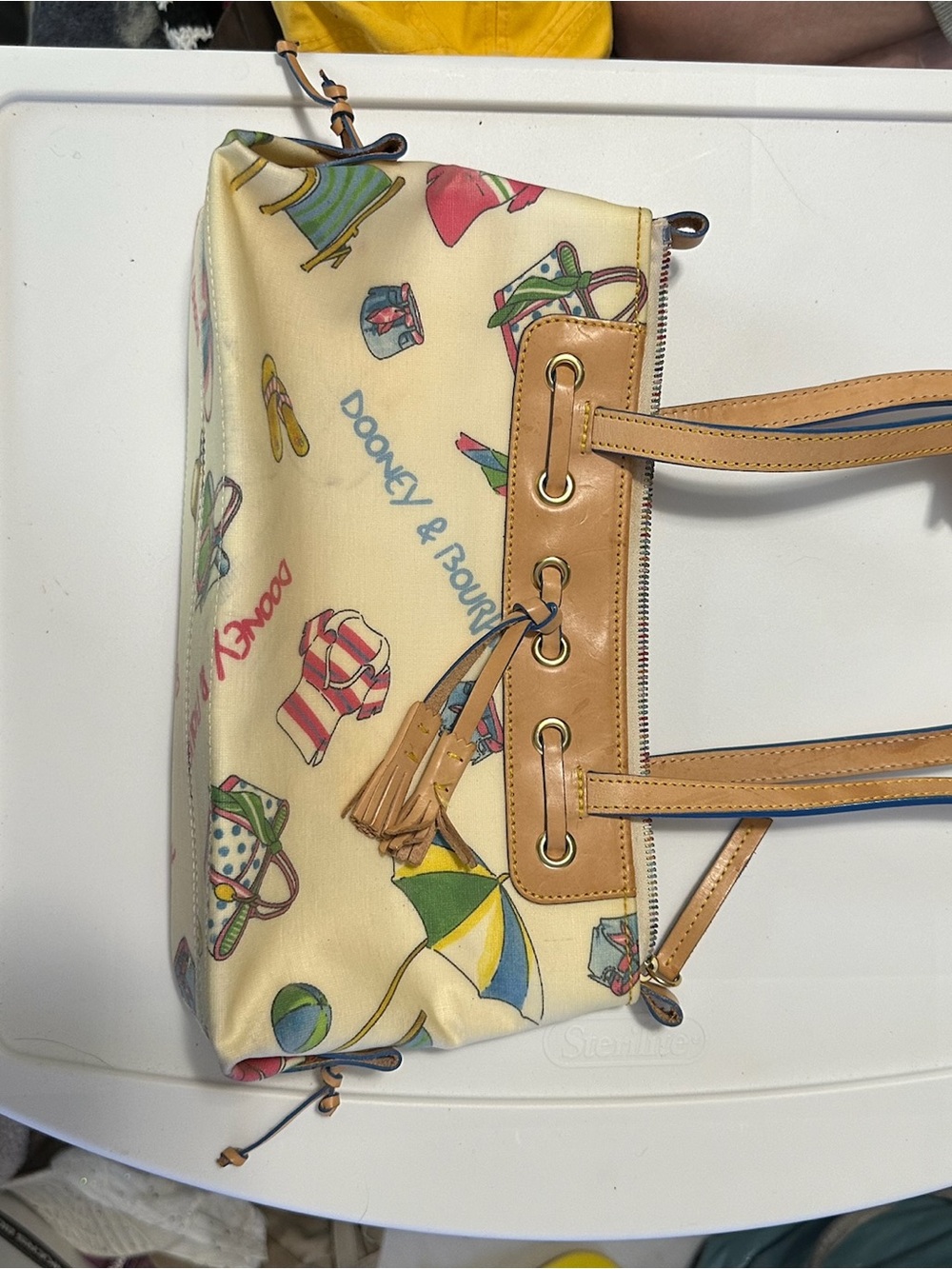 Dooney & Bourke Cream Canvas Tote with Tan Leather Trim and Multicolor Print
